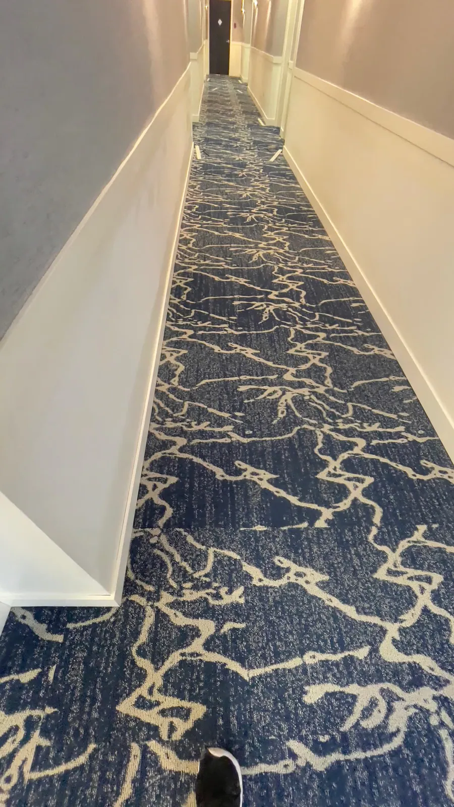 Patterned commercial carpet and stair installation