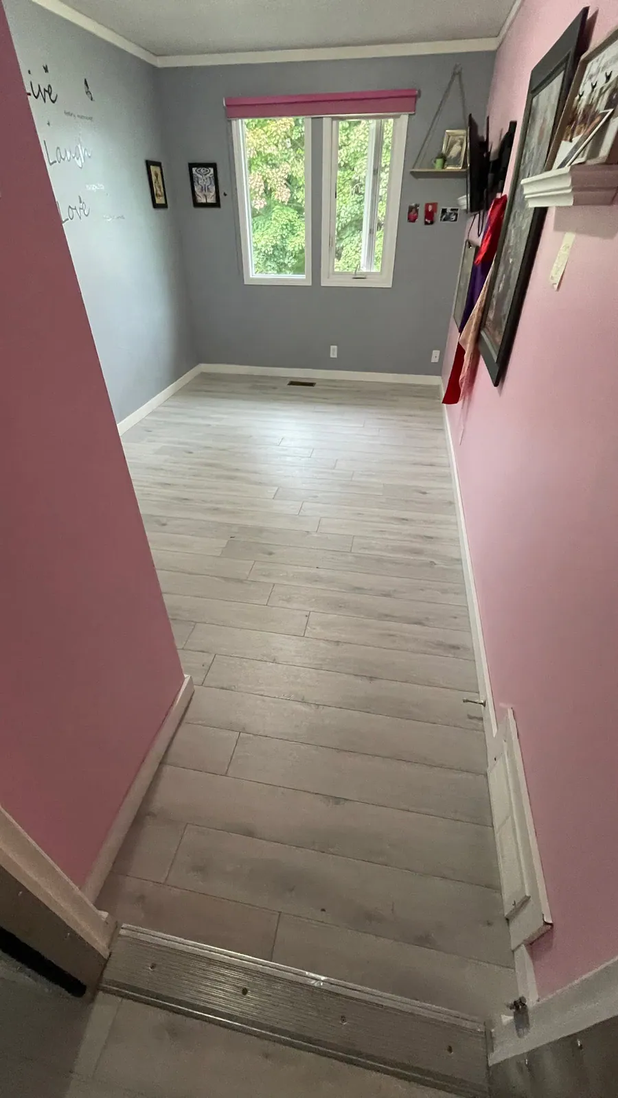 Luxury vinyl plank entry transition detail