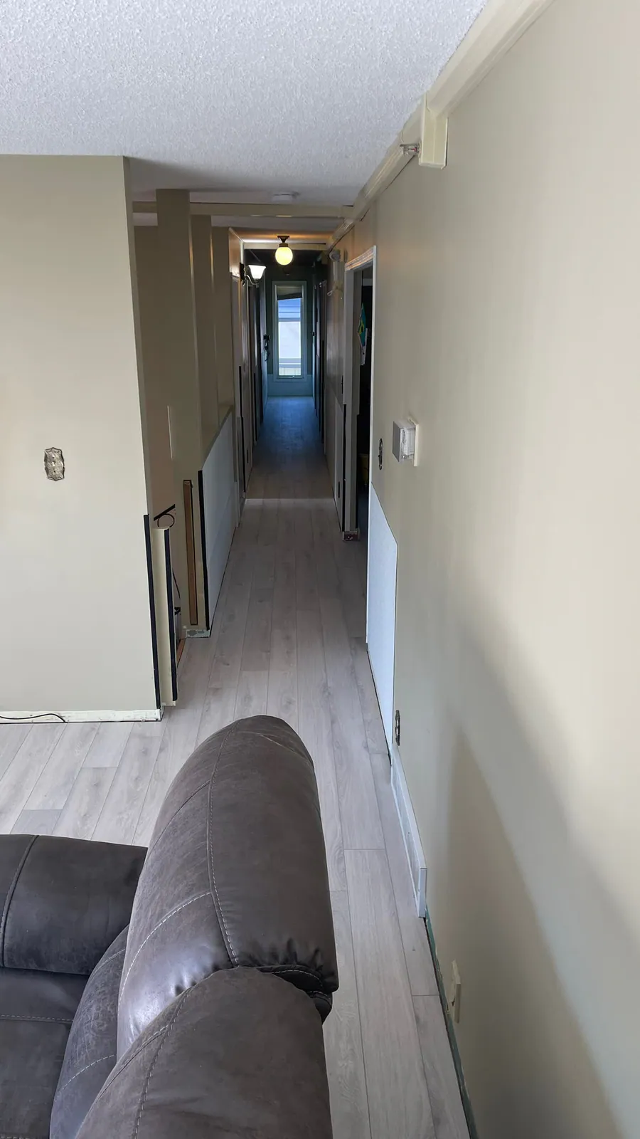 Luxury vinyl plank running through a hallway