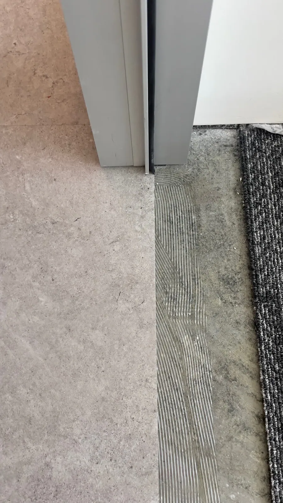 Finished marble-look tile installation